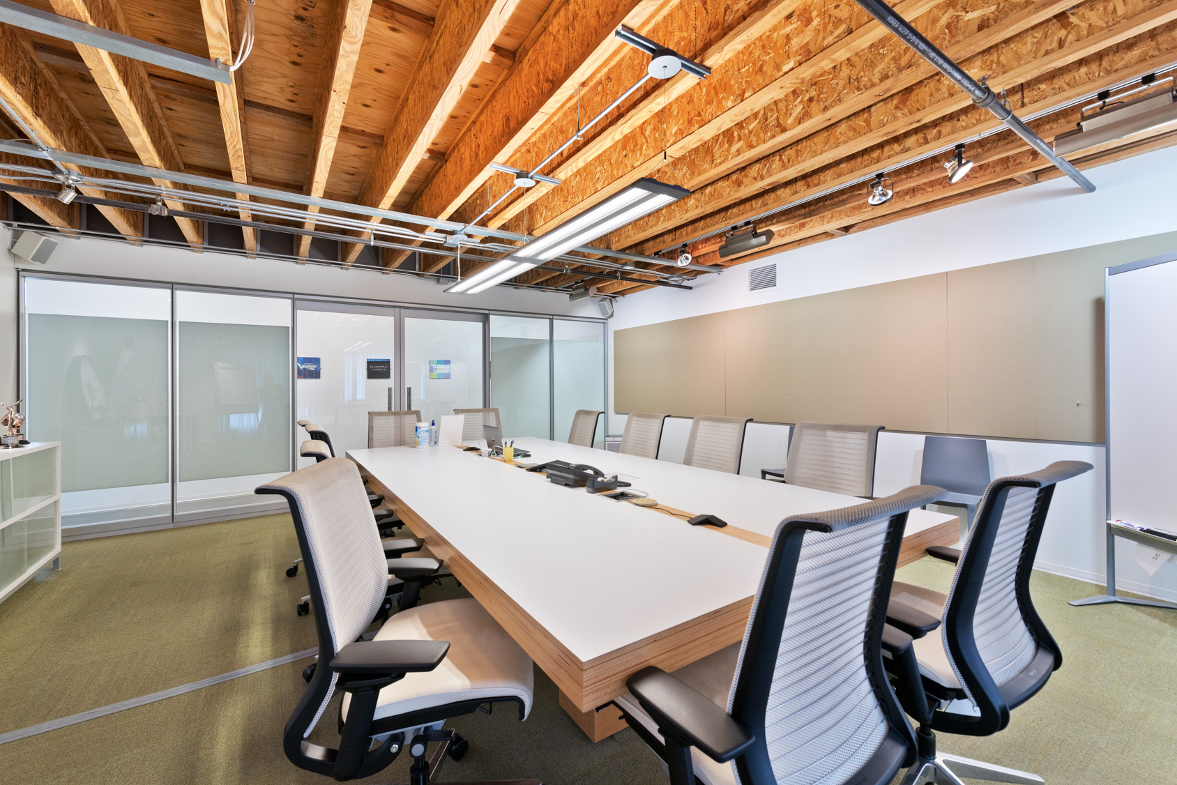 Conference room with wood-beam ceilings