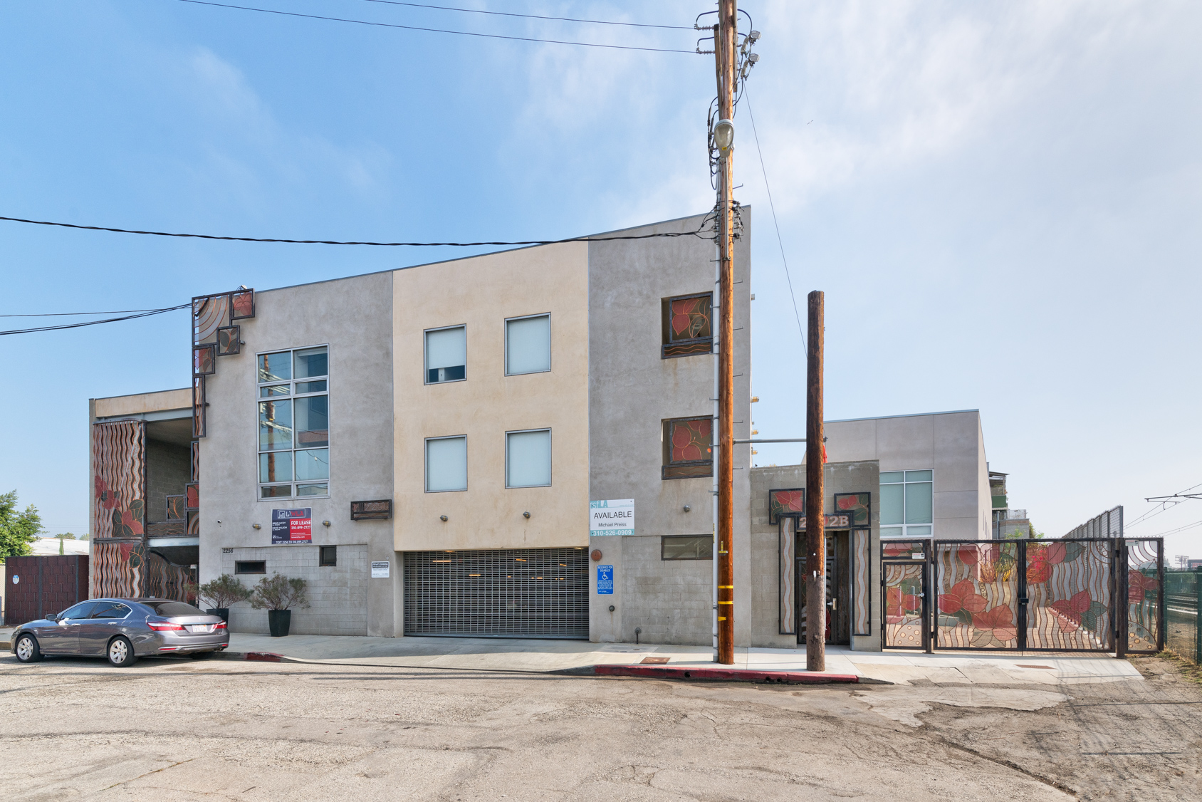 Street-level facade with art panels